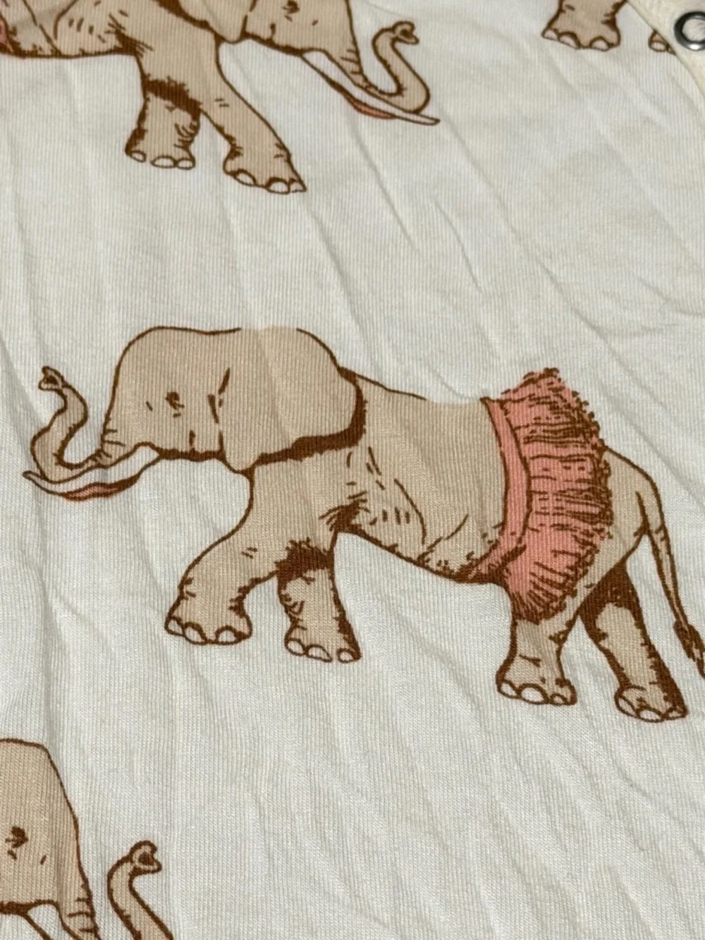Milkbarn Cream Footed One-Piece with Peach Elephant Print